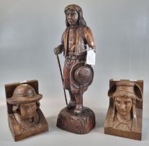 A mixed group of carved wooden treen items comprising; a standing male figure dressed in 17th