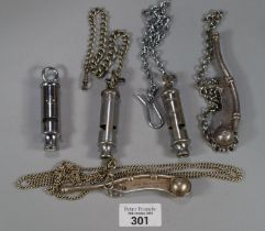 Collection of assorted whistles including Bosun's Whistle, Belgian Army Whistle, two Metropolitan