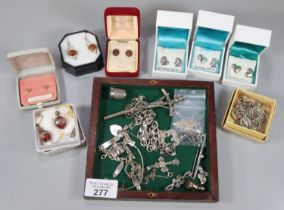 Collection of mainly silver jewellery to include: St Justin earrings, amber earrings, chains with