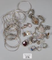 Collection of silver jewellery and other items to include: bangles, charms, rings, chains etc. (B.P.