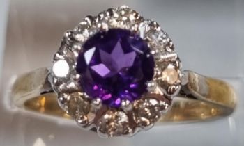 9ct gold purple stone and diamond cluster ring. 2.9g approx. Size N1/2. (B.P. 21% + VAT)