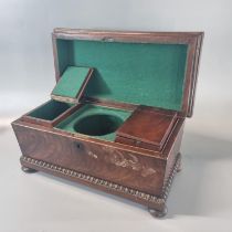 19th century mahogany sarcophagus shaped tea caddy on bun feet. (B.P. 21% + VAT)