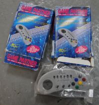 Two Super Nintendo SNES third party 'Game Partner' boxed controllers. (B.P. 21% + VAT)