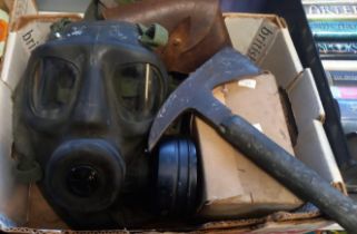 Collection of military items to include: gas mask, leather holster, further gas mask in original box