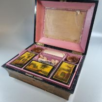 19th century distressed ladies work box, the interior revealing fitted compartments with a small