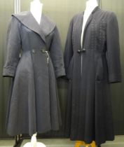Two 1940's vintage navy coloured coats, one in faille fabric with wide collar and cinched waist, the