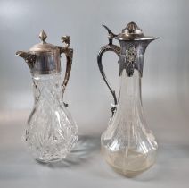 Two cut glass claret jugs with silver plated collar and handles, one in Art Nouveau style the