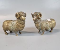 Pair of yellow metal, probably bronze rams. 12cm long approx. (2) (B.P. 21% + VAT)