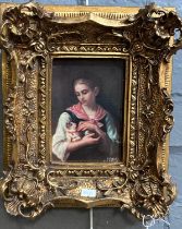 After Bouchon, portrait of a young girl with kitten, a modern reproduction in heavy gilt frame.