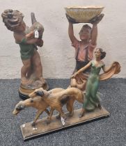 Three 1930's/40's plaster figurines and figure groups to include: Art Deco lady with hounds, young