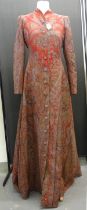 Woollen Edwardian paisley pattern house coat with red crepe lining. (B.P. 21% + VAT)