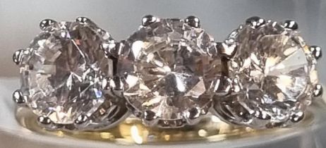 9ct gold three stone dress ring. 3g approx. Size N. (B.P. 21% + VAT)