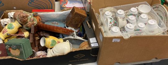 Box of assorted items to include: pottery vases, carved elephant bookends, cowrie shells, wall