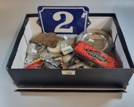 Box of oddments to include: number 2 enamel sign, car badges including GT and AA, loose plated