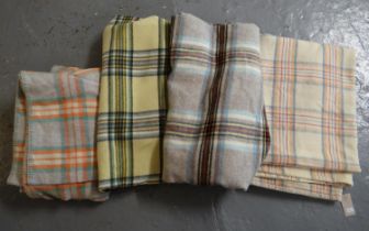 Collection of four vintage woollen check blankets or carthen in different colourways. (4) (B.P.