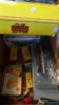 Box of assorted toys to include: two diecast model ships, reproduction Dinky vehicles and petrol
