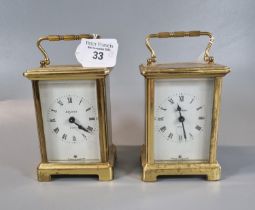 Two modern brass carriage clocks with full depth Roman faces. 12cm high approx. (2) (B.P. 21% + VAT)