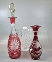 Cranberry and clear glass flash cut mallet shaped decanter and stopper together with a Waterford