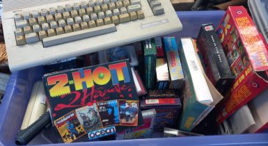 Commodore 64C personal computer and a large collection of computer games, cassettes and accessories,