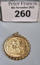 Edward VII gold Full Sovereign in 9ct gold mount with suspension loop. 10g approx. (B.P. 21% + VAT)