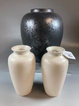 Three baluster shaped speckle glazed Poole pottery vases. (3) (B.P. 21% + VAT)