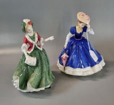 Two Royal Doulton bone china figurines to include: Figure of the Year 'Mary' 1992 and Christmas