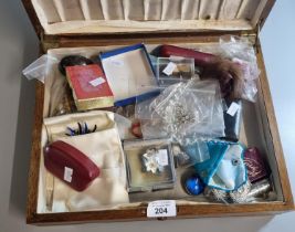 Oak box comprising assorted oddments to include: specimen egg, brooches, earrings, other costume