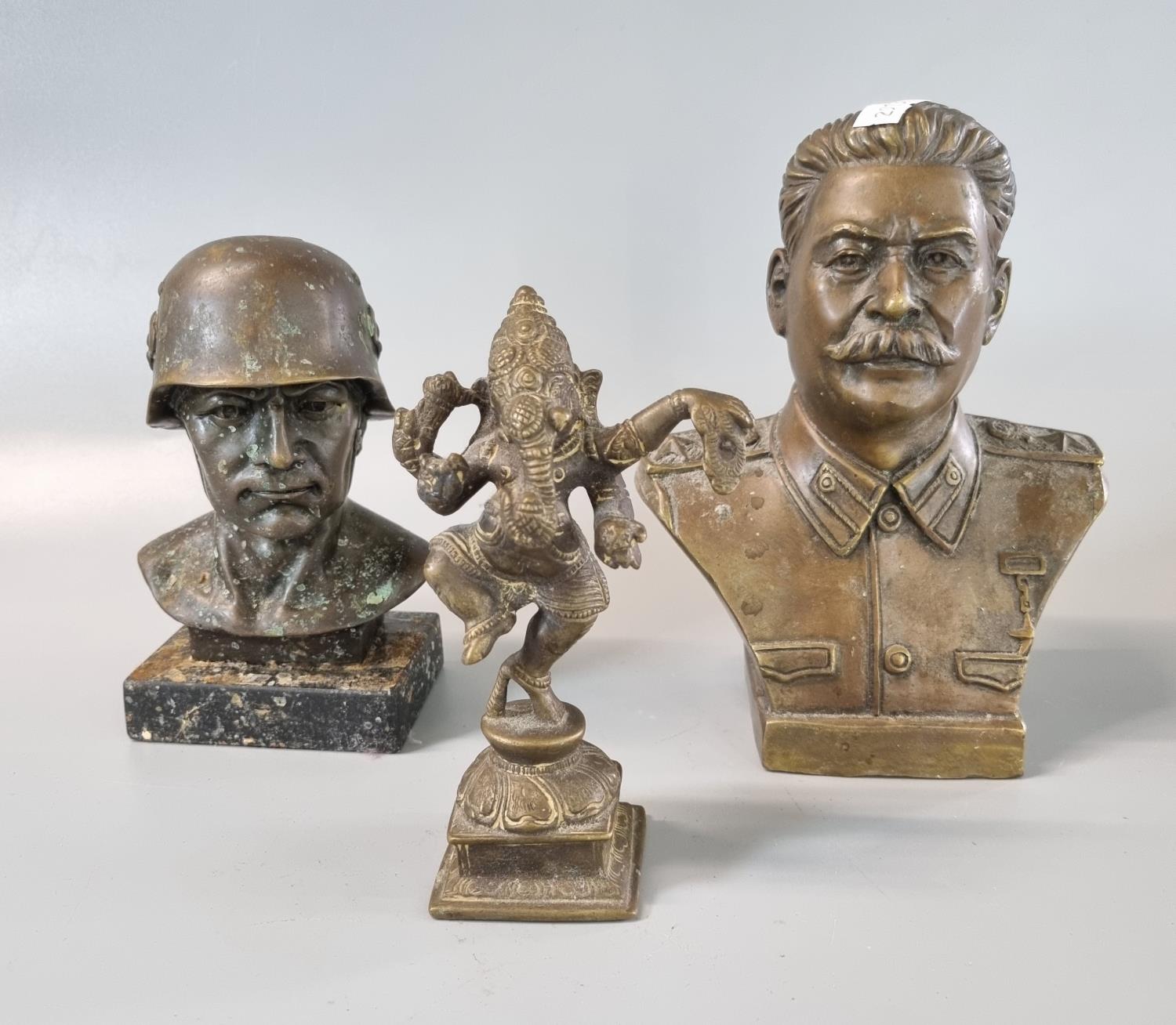 Brass study of Hindu God Ganesh together with a bronzed bust of Soviet Union's Chairman Joseph