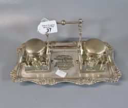 Silver plated presentation ink stand with two glass inkwells, having presentation inscription '