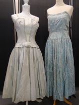 Three vintage 1950's/60's cocktail dresses to include: pale blue faille with ribbon embroidery and