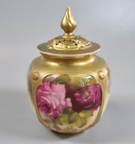 Royal Worcester porcelain potpourri vase and reticulated cover, hand painted with panels of roses