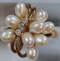 9ct gold modernist design diamond and pearl ring. 3.2 g approx. Size N1/2. (B.P. 21% + VAT)
