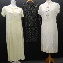 Three vintage 1940's to 1960's dresses to include: a crepe geometric design long sleeve 40's