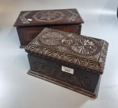 Two chip carved wooden jewellery caskets, the interior on both revealing assorted jewellery to