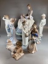 Group of Nao Spanish porcelain figurines to include: six figurines of children and a larger seated