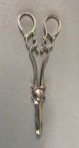 Pair of silver grape scissors, by James Deekin & sons. Sheffield hallmarks. 2.35 troy oz approx. (