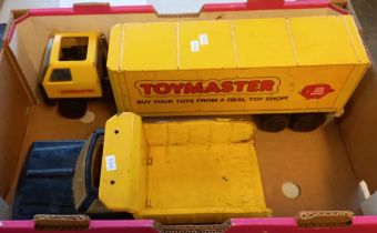 Group of four tinplate Tonka toys and similar, including: Bulldozer, Tractor, Articulated Truck