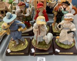 Collection of six Madam Tussauds ceramic figurines on wooden bases to include: 'Little Boy Blue', '