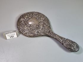 Edwardian design silver vanity ladies hand dressing table mirror with repoussé decoration of birds