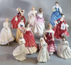 Twelve Royal Doulton bone china figurines to include: 'Autumn Breezes', 'Alexandra', 'Amanda', '