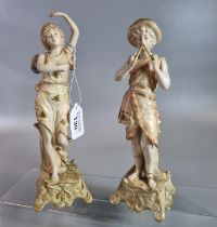 Pair of Austrian blush ivory figurines of a flute player and another lady. (2) (B.P. 21% + VAT)