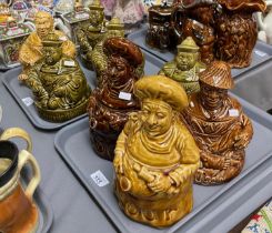 Collection of eight Sadler ceramic 'flour' jars and covers in the form of seated men and bakers. (8)