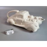 Novelty ceramic teapot in the form of a racing car. (B.P. 21% + VAT)