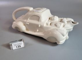 Novelty ceramic teapot in the form of a racing car. (B.P. 21% + VAT)