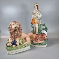19th century Staffordshire Pottery study of a lion with dead man, together with a large