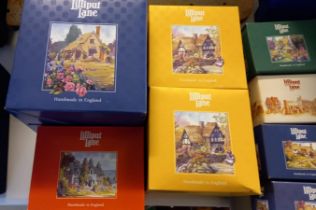 Box containing a large collection of Lilliput Lane cottages, various and assorted, some large some