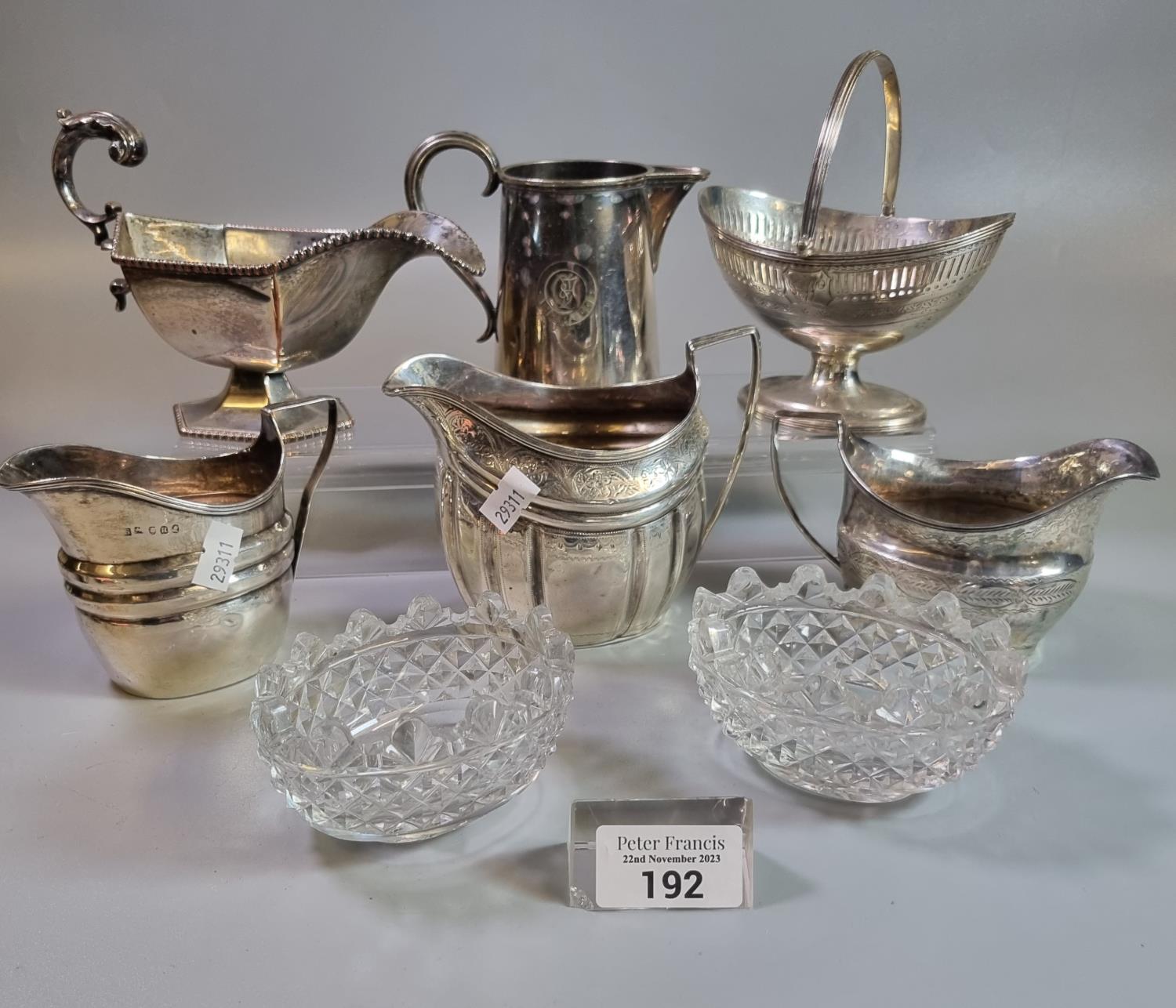 Collection of silver and silver plated items to include: three helmet shaped cream jugs and silver