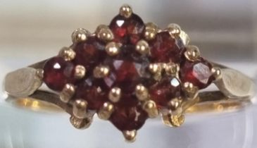 9ct gold garnet cluster dress ring. 2g approx. Size L1/2. (B.P. 21% + VAT)