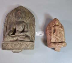 Moulded stone sculpture of Ratnasambhava Buddha together with another carved Buddha style