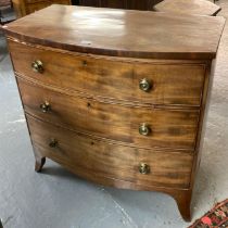 19th century mahogany bow front chest of three long drawers on splay legs. 91x50x88cm approx. (B.